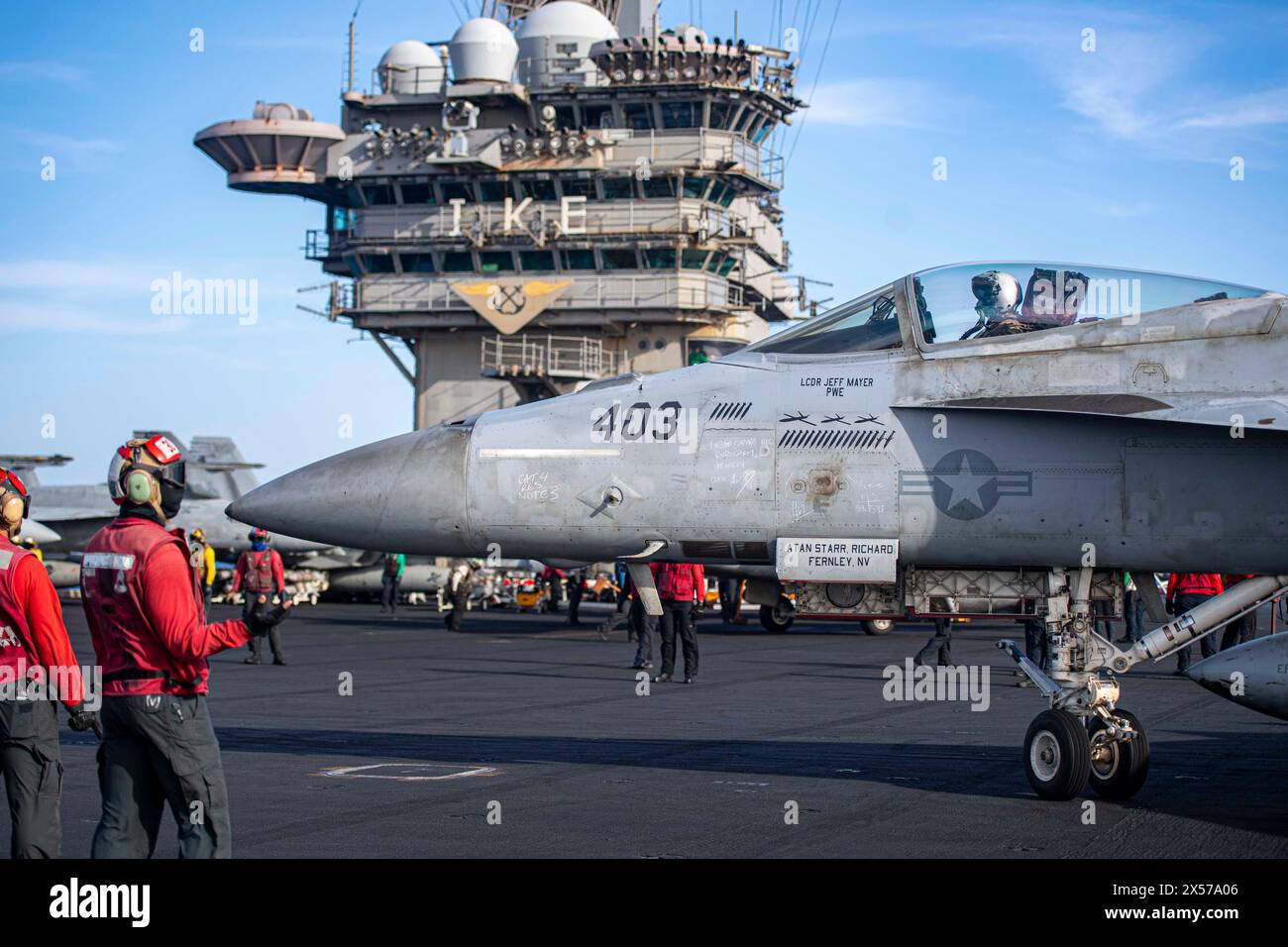 Red Sea, United States. 12 April, 2024. U.S. Navy sailors Aviation Ordnancemen wait to inspect ordnance attached to a F/A-18E Super Hornet fighter jet, attached to the Gunslingers of Strike Fighter Squadron 105, before launch off the flight deck of the Nimitz-class aircraft carrier USS Dwight D. Eisenhower in support of Operation Prosperity Guardian, April 12, 2024 on the Red Sea. Credit: MC3 Janae Chambers/U.S. Navy Photo/Alamy Live News Stock Photo