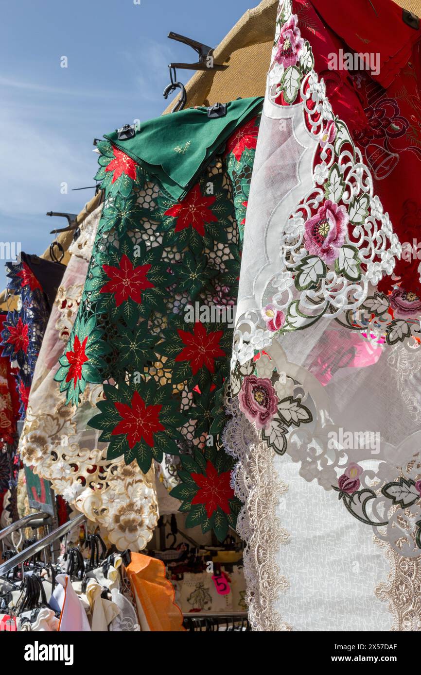 Lace and embroidered cloth at sunday market, Teguise, Lanzarote, Canary Islands, Spain Stock Photo
