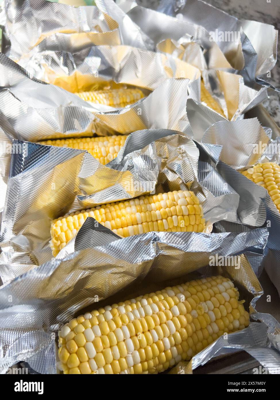 Fresh Corn on the Cob in VacuumSealed Packaging Stock Photo Alamy