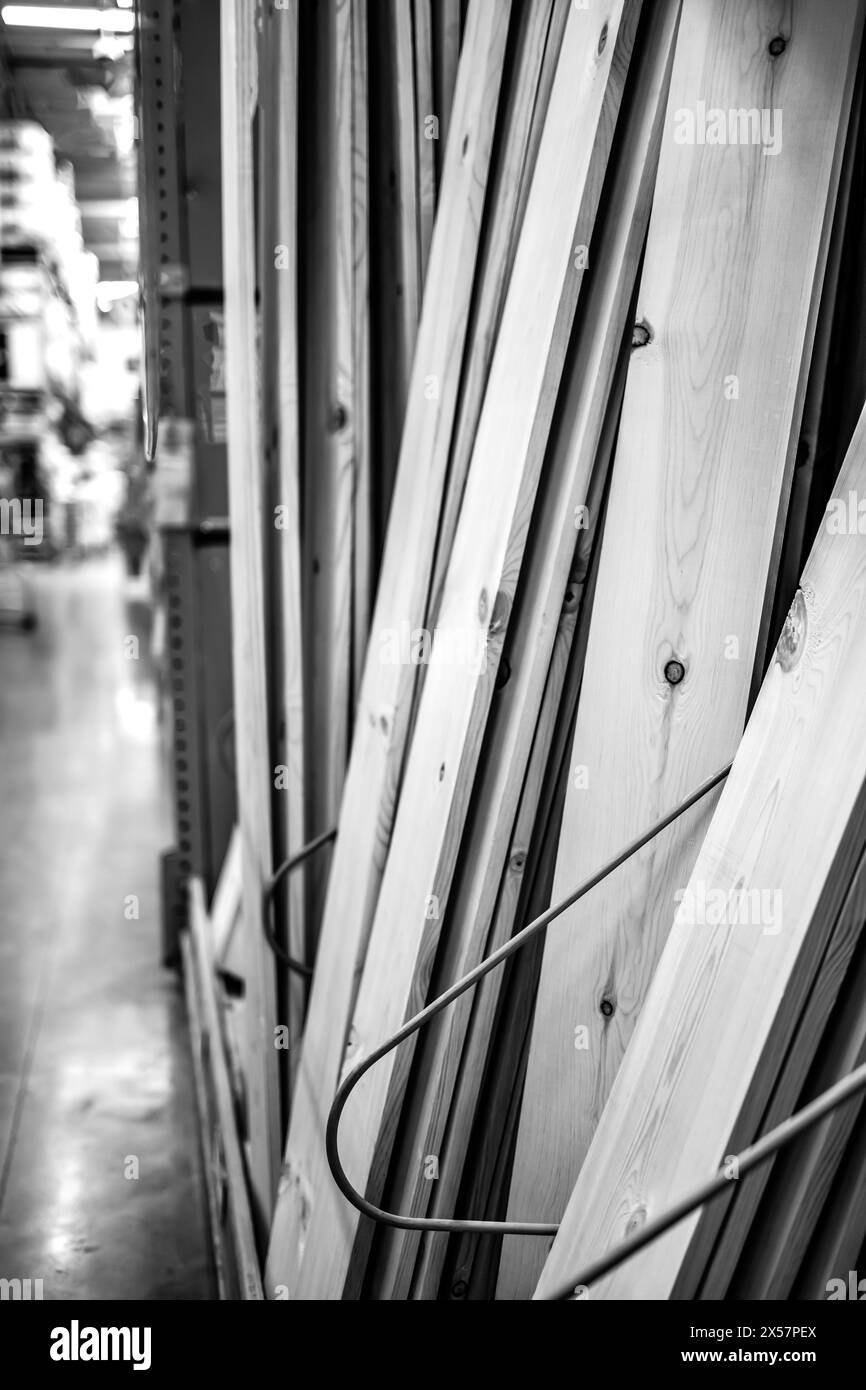 vertical lumber storage racks at a big box warehouse lumberyard Stock