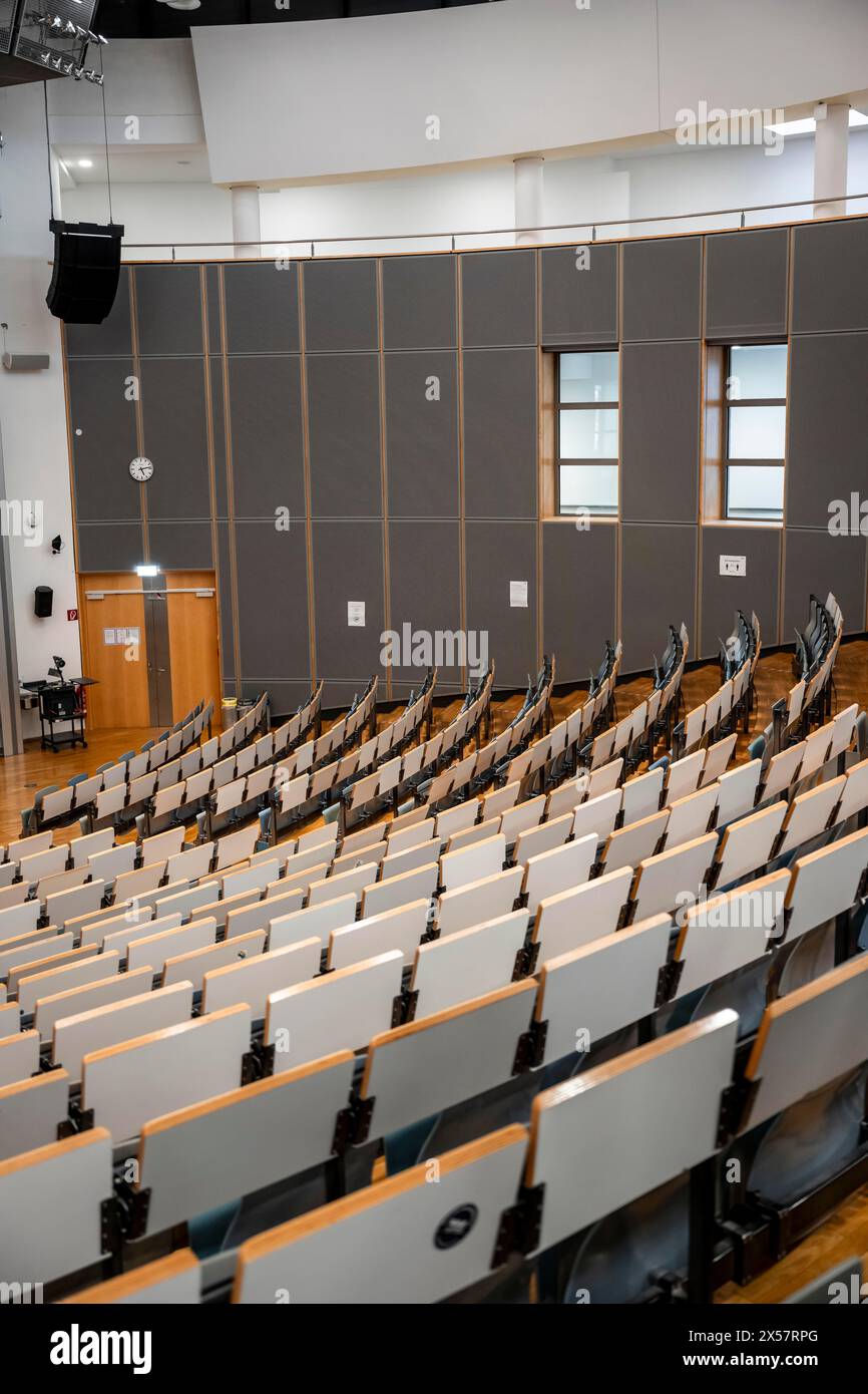 Rows of seats in an empty lecture theatre, interior photo, Department