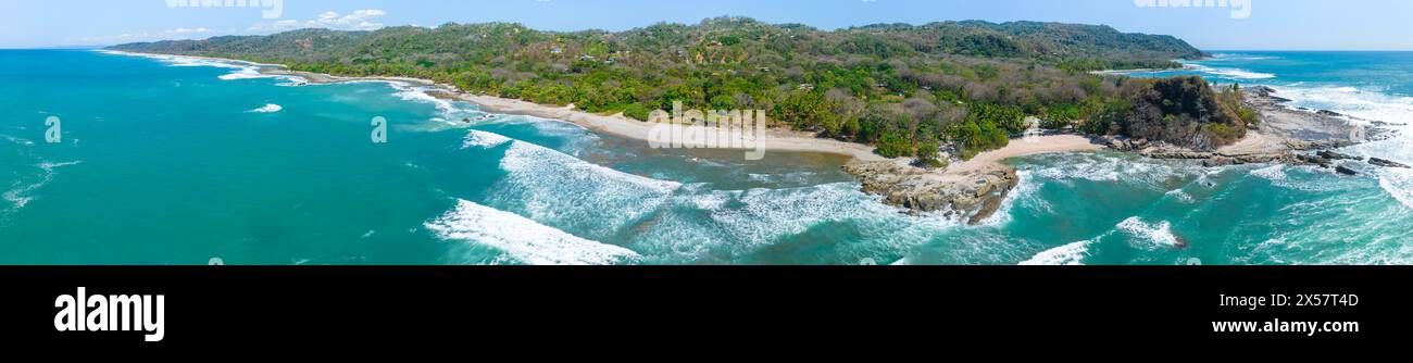 Aerial view, sandy beach and coast with waves, Playa Santa Teresa, Costa Rica Stock Photo