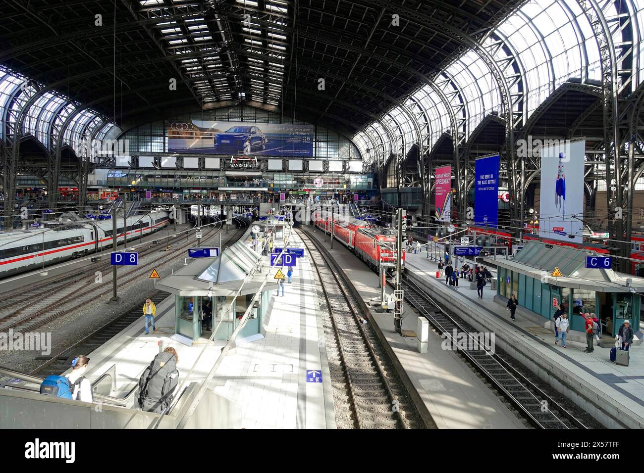 Hamburg Central Station, Hamburg, Germany, Europe, Wide angle shot of an almost empty railway station with trains, platforms and an impressive roof Stock Photo