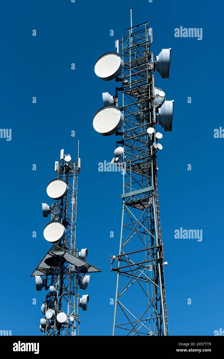 Transmission masts with antennas on the telecommunications tower of Deutsche Telekom, transmission tower, summit of Hoherodskopf mountain, excursion Stock Photo