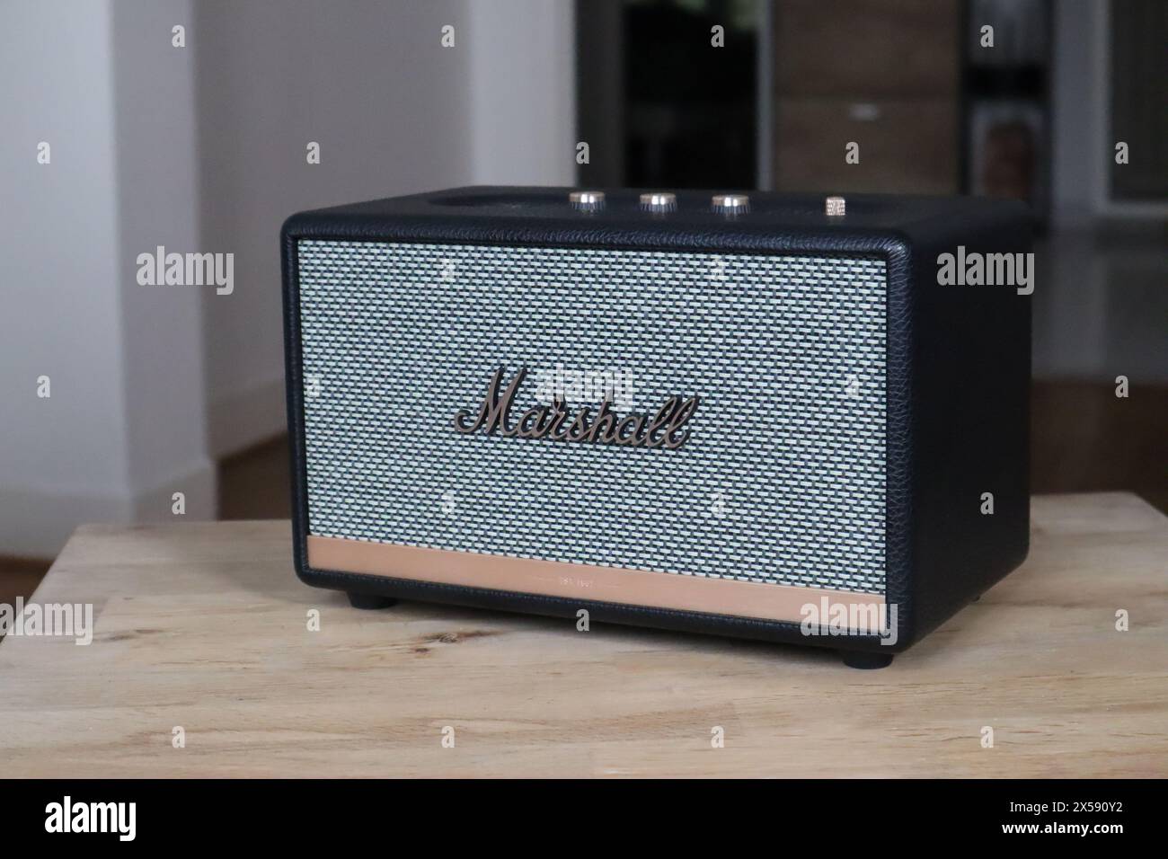 Nice, France - 27.01.2024: Marshall sound system in the interior on a wooden table Stock Photo