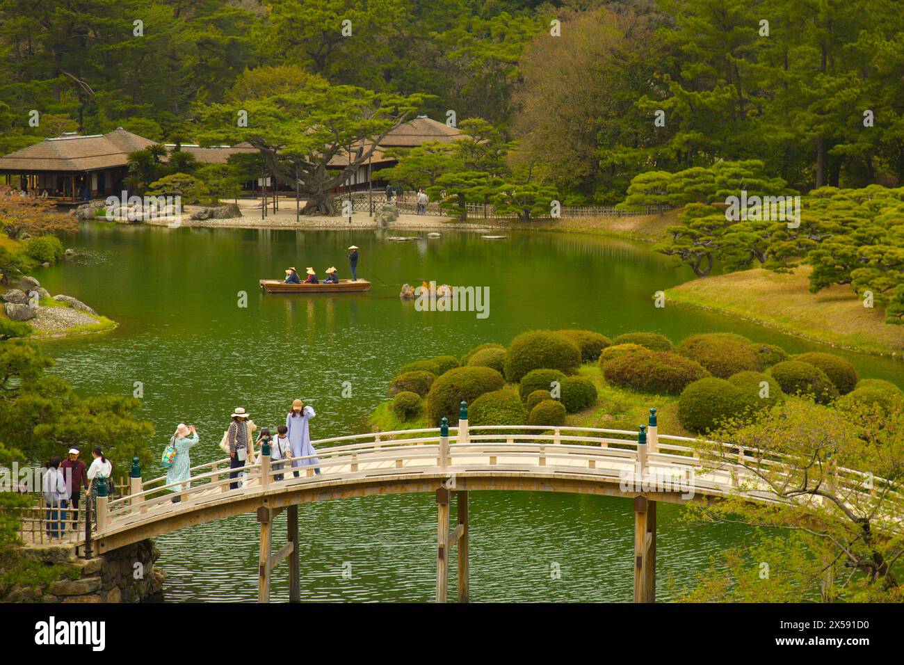 Japan, Shikoku, Takamatsu, Ritsurin-koen, garden, bridge, people, Stock Photo