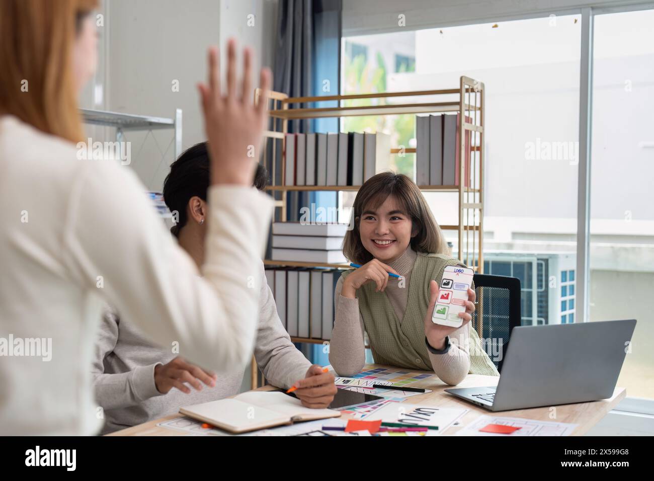 team of UI UX web designer are working together to develop mobile ...