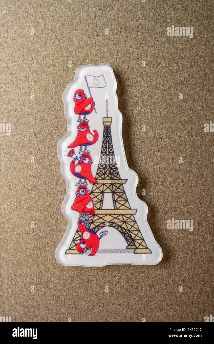 ZHONGSHAN China-April 28 2024: top view refrigerator magnet with 2024 Paris Olympic Games mascot the Phryge. Stock Photo