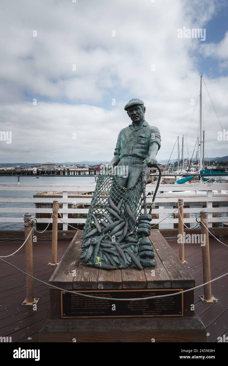 Life Size Fisherman Statue on Wooden Pier, Coastal Setting with ...