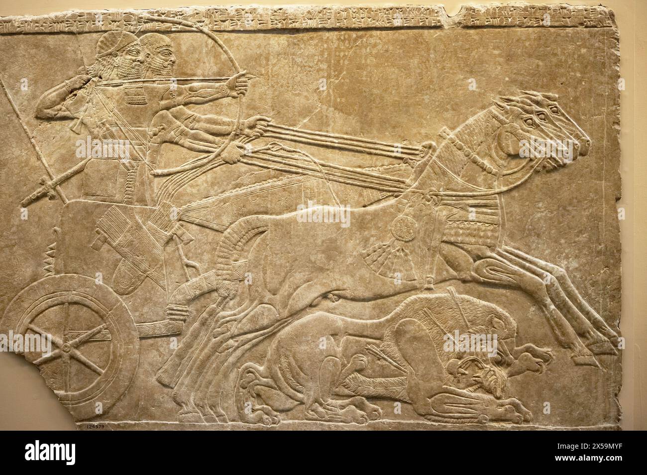 Stone panel from the Palace of Ashurnasirpal II, Nimrud Palace Reliefs, The British Museum, London. England. UK. Stock Photo