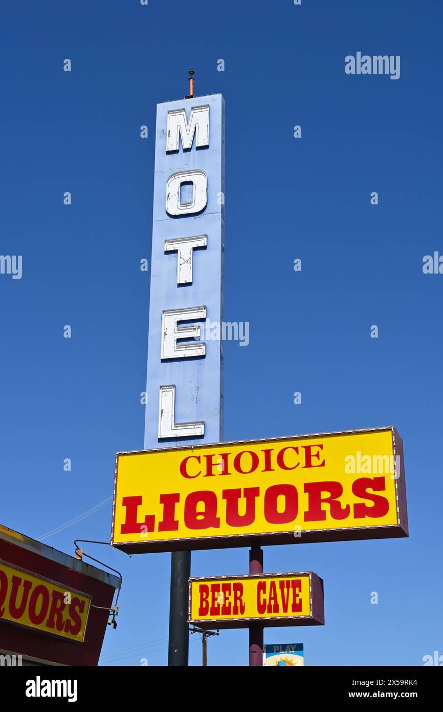 WHITTIER, CALIFORNIA - 28 APR 2024: Whittier Budget Inn Motel and Choice Liquors signs on Whittier Boulevard. Stock Photo