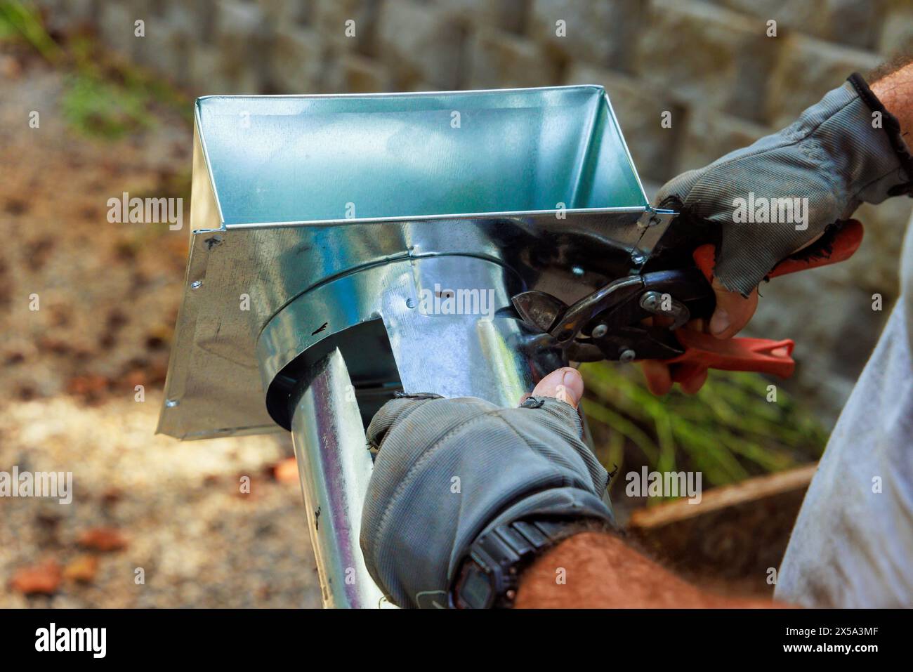 Installation of an external extractor galvanized steel air duct vent