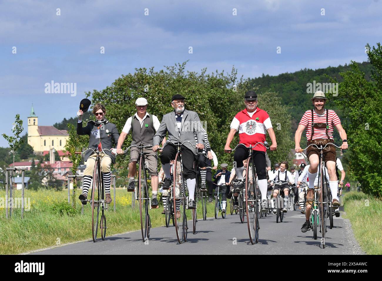 May 8, 2024, Vsen, Czech Republic: Historic High Wheel Penny-farthing bicycle ride in Vsen in the Bohemian Paradise region of the Czech Republic. Vintage with a bright twist, hoping to win the best dressed bike competition in the annual Historic High Wheel Penny-farthing bicycles ride. The penny-farthing, also known as a high wheel and ordinary, is a type of bicycle with a large front wheel and a much smaller rear wheel. It was popular after the boneshaker until the development of the safety bicycle in the 1880s. It was the first machine to be called a ''bicycle' (Credit Image: © Slavek Ruta/Z Stock Photo