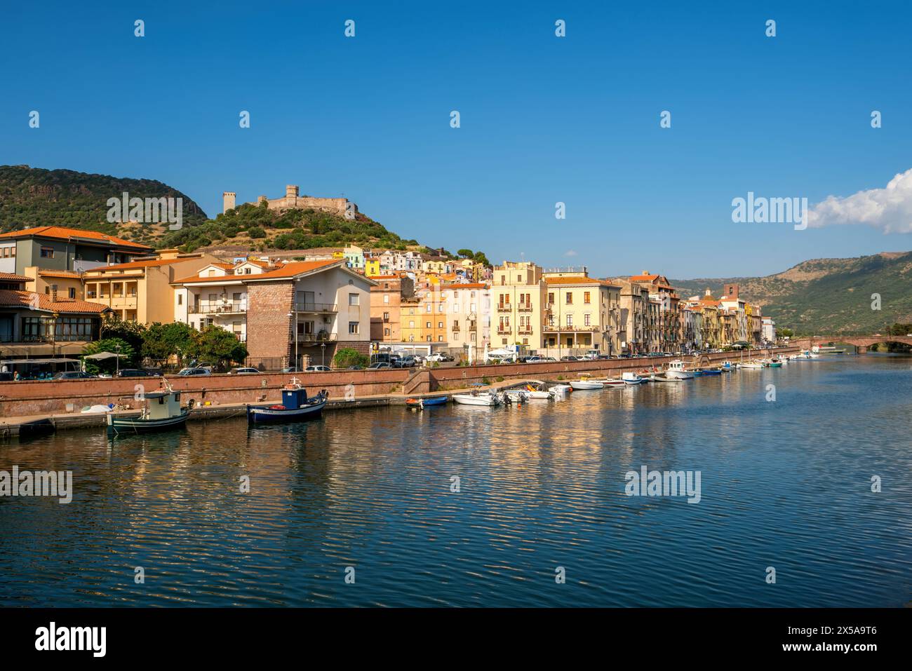 A picturesque scene in Sardinia, Italy, showcasing vibrant buildings ...