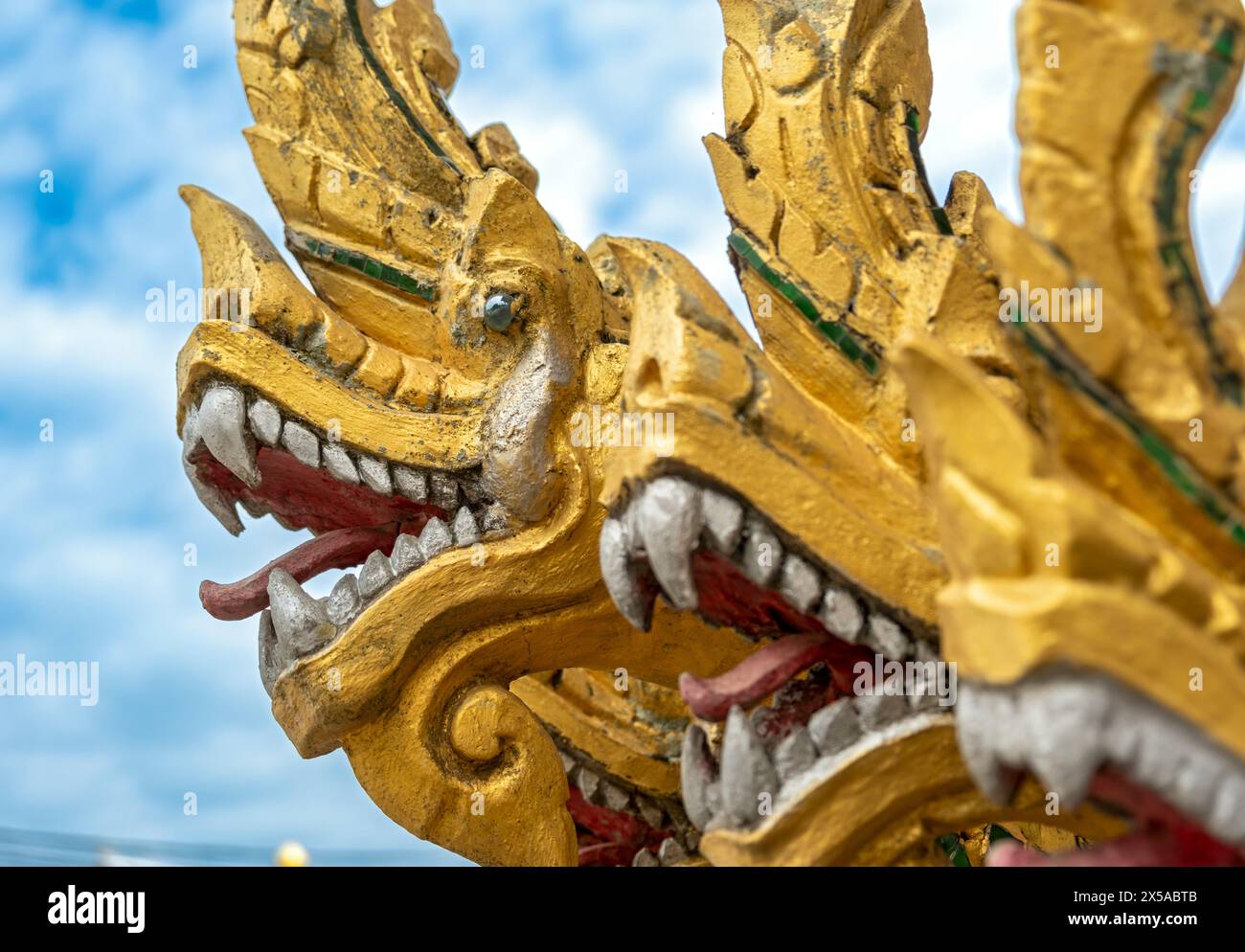 Naga deities at Wat Nong Sikhounmuang, Luang Prabang, Laos Stock Photo