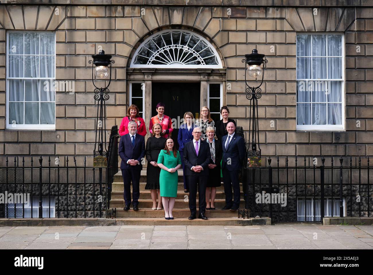 Newly appointed First Minister of Scotland John Swinney stands with his newly appointed Cabinet members (top row - left to right)Fiona Hislop, Angela Constance, Jenny Gilruth, Shirley-Anne Somerville and Mairi Gougeon, (front row left to right) Angus Robertson, Mairi McAllan, Kate Forbes, John Swinney, Shona Robison and Neil Gray, on the steps of Bute House, Edinburgh. Picture date: Wednesday May 8, 2024. Stock Photo