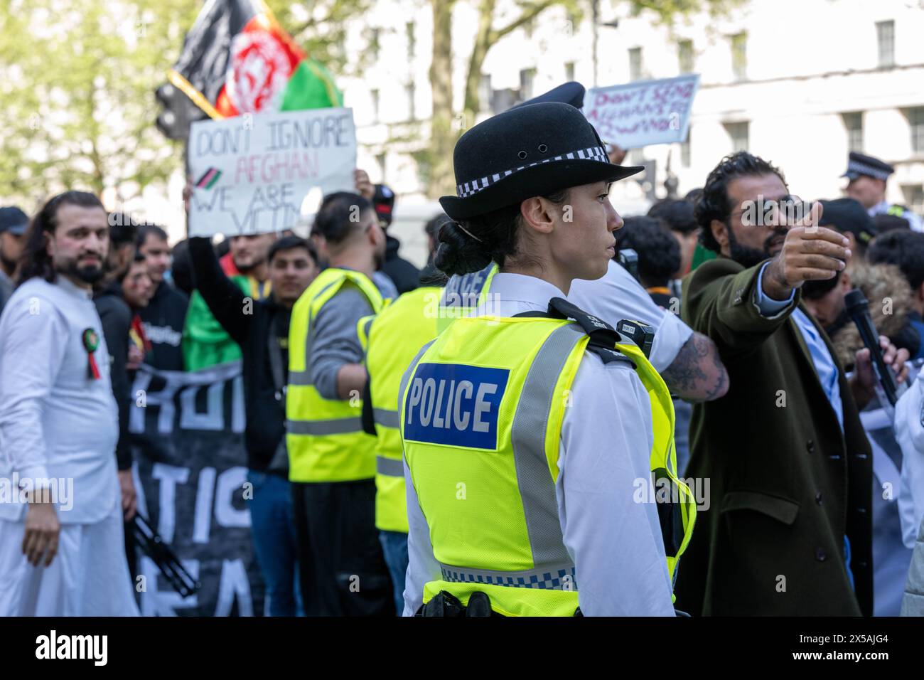 London, UK. 08th May, 2024. Afghans protest against the Rwanda deportation process outside Downing Street London UK Credit: Ian Davidson/Alamy Live News Stock Photo