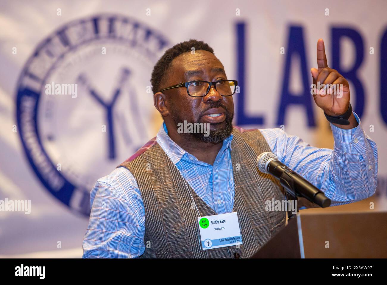 Chicago, Illinois - Brahim Kone of Service Employees Local 26 speaks at the 2024 Labor Notes conference, The conference brought together 4,700 union a Stock Photo
