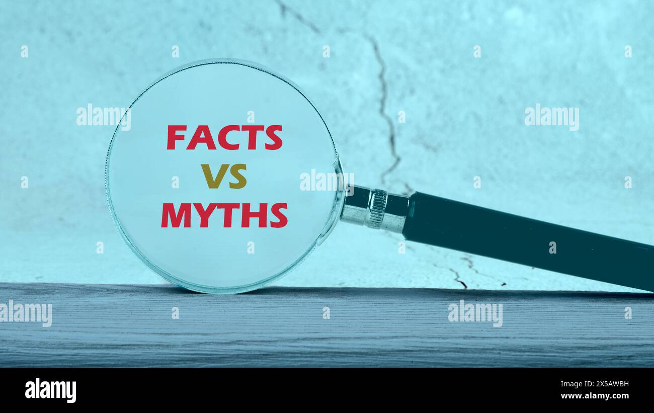 Conceptual symbol. Copy space. Facts vs myths words written through a ...