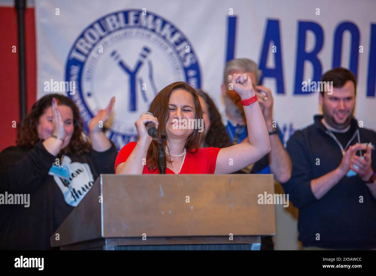 Chicago, Illinois - Members of the Massachusetts Teachers Association celebrate the Troublemaker Award they received at the 2024 Labor Notes conferenc Stock Photo
