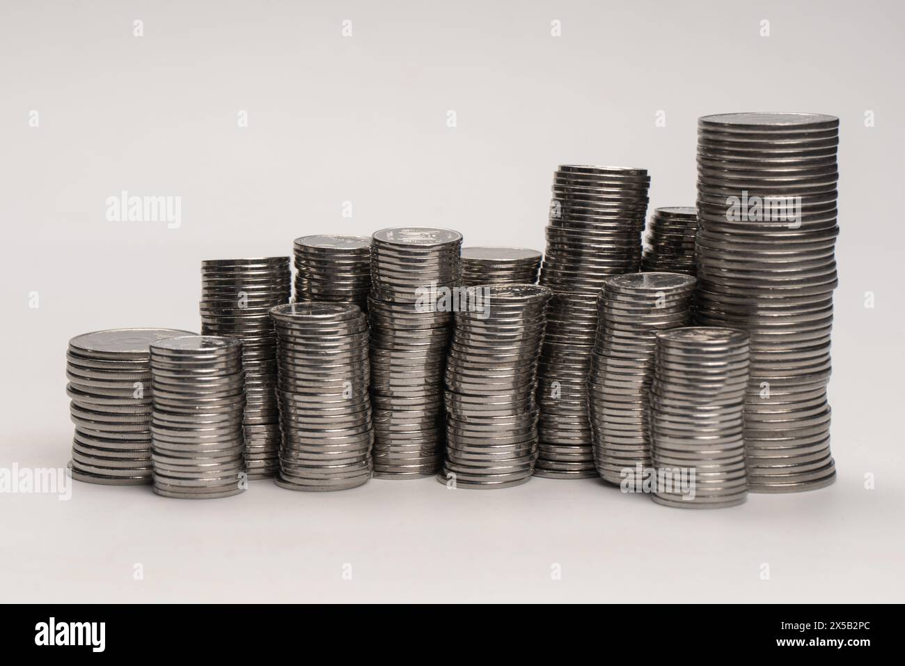 Pile of coins isolated on a white background. Banking and money. Stock Photo