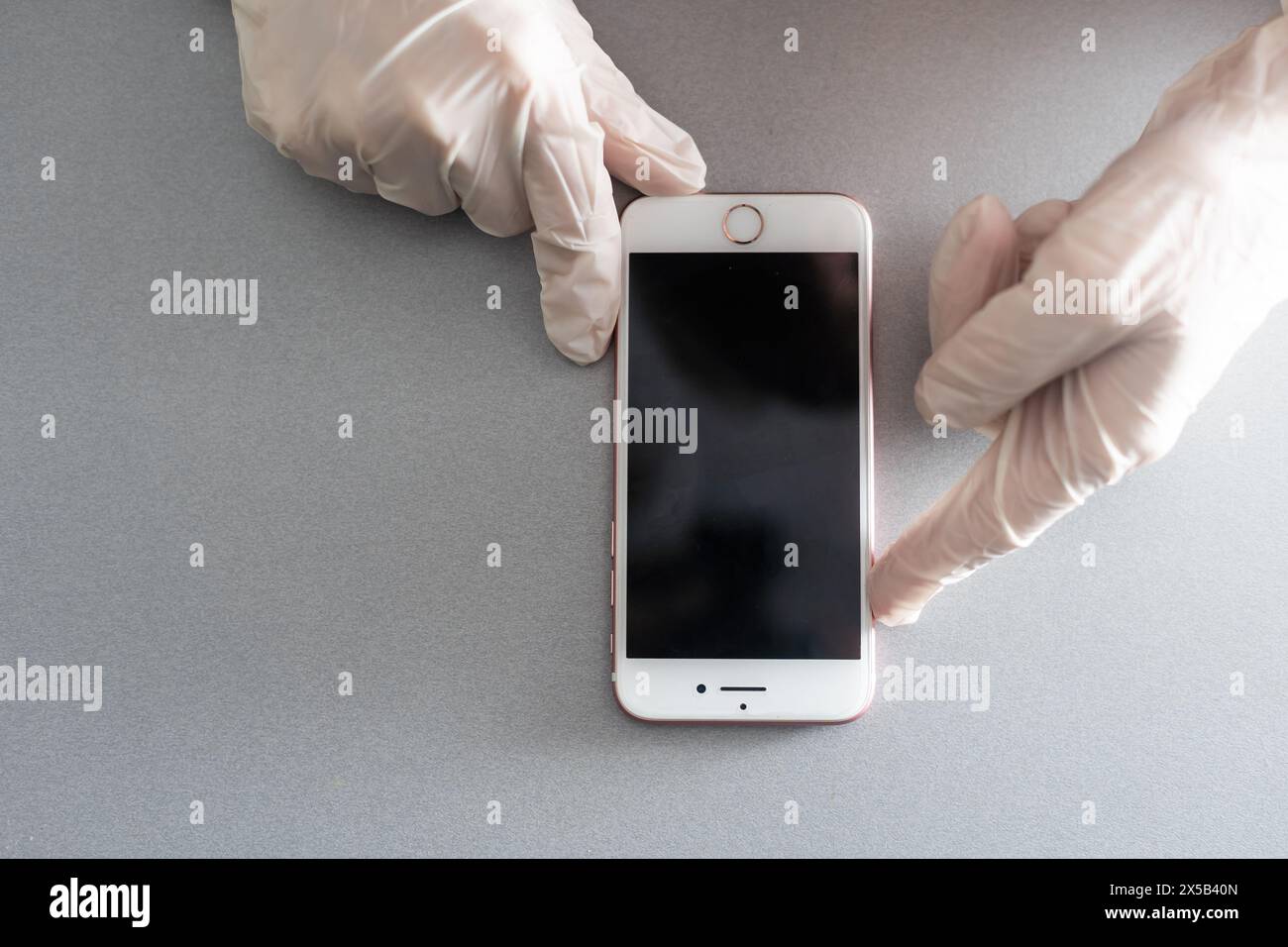 hands holding pressing smartphone buttons Stock Photo