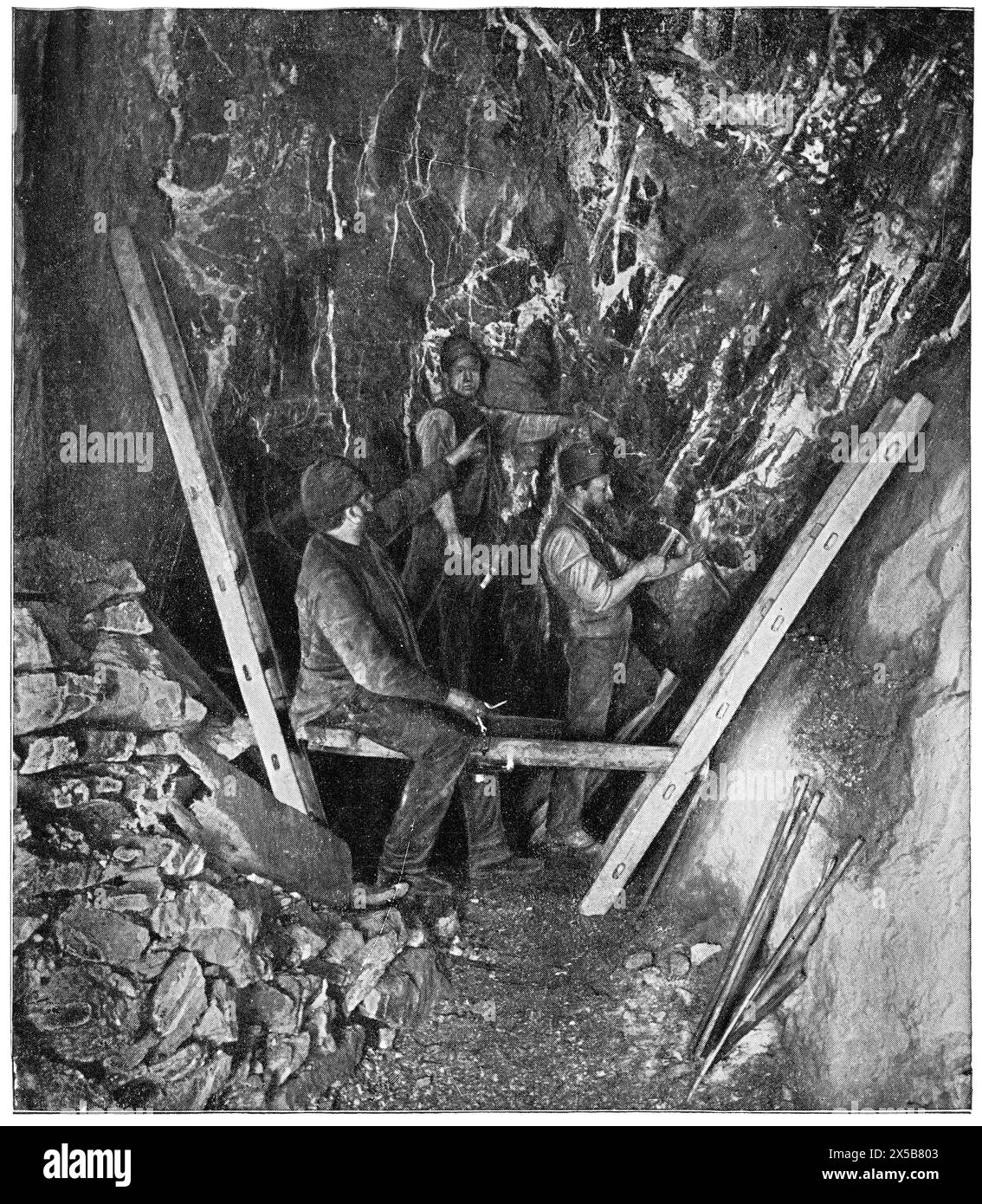 Mining an ore deposit (ridge construction). Production of the blast drill holes. Upper Harz. Publication of the book 'Meyers Konversations-Lexikon' Stock Photo