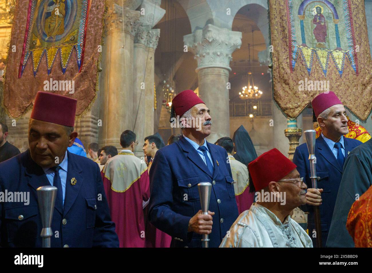 Devotees seen during the procession around the aediculae in the Church ...