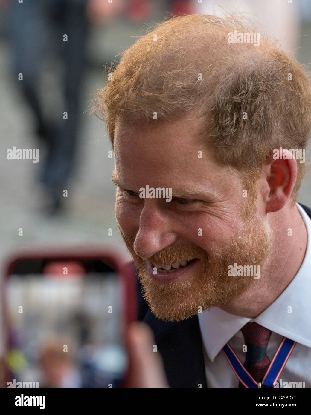 London, UK 8th May 2024 Prince Harry Leaves St Paul's Cathedral, after attending a service to commenmorate the tenth anniversary of the Invictus Games.  He is greeted outside by cheering crowds and stops to shake hands with supporters and well-wishers. Stock Photo