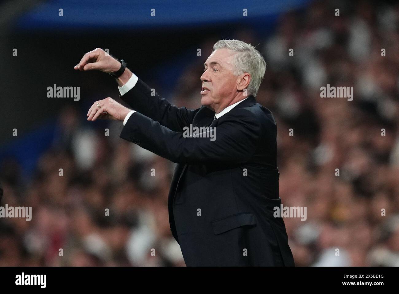 Madrid, Spain. 08th May, 2024. Real Madrid head coach Carlo Ancelotti during the UEFA Champions League match, Semi-finals, 2nd leg, between Real Madrid and FC Bayern Munchen played at Santiago Bernabeu Stadium on May 8, 2024 in Madrid Spain. (Photo by Sergio Ruiz/PRESSINPHOTO) Credit: PRESSINPHOTO SPORTS AGENCY/Alamy Live News Stock Photo