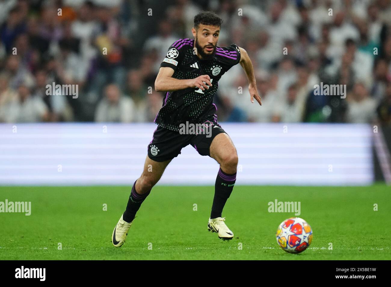 Madrid, Spain. 08th May, 2024. Noussair Mazraoui of Bayern Munchen during the UEFA Champions League match, Semi-finals, 2nd leg, between Real Madrid and FC Bayern Munchen played at Santiago Bernabeu Stadium on May 8, 2024 in Madrid Spain. (Photo by Sergio Ruiz/PRESSINPHOTO) Credit: PRESSINPHOTO SPORTS AGENCY/Alamy Live News Stock Photo