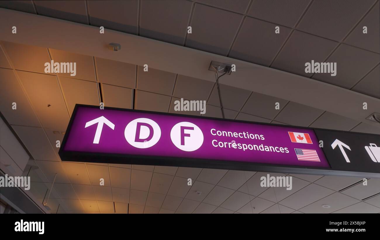 Directions signs at Toronto Pearson International Airport - TORONTO, ONTARIO - APRIL 15, 2024 Stock Photo
