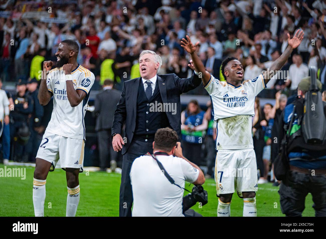 Madrid, Madrid, Spain. 8th May, 2024. MADRID, SPAIN - MAY 8: Antonio Rudiger (L), Carlo Ancelotti (C) and Vinicius Junior (R) of Real Madrid seen celebrating the victory at the end of the UEFA Champions League semi-final second leg match between Real Madrid and FC Bayern Munchen at Estadio Santiago Bernabeu on May 8, 2024 in Madrid, Spain. (Credit Image: © Alberto Gardin/ZUMA Press Wire) EDITORIAL USAGE ONLY! Not for Commercial USAGE! Stock Photo