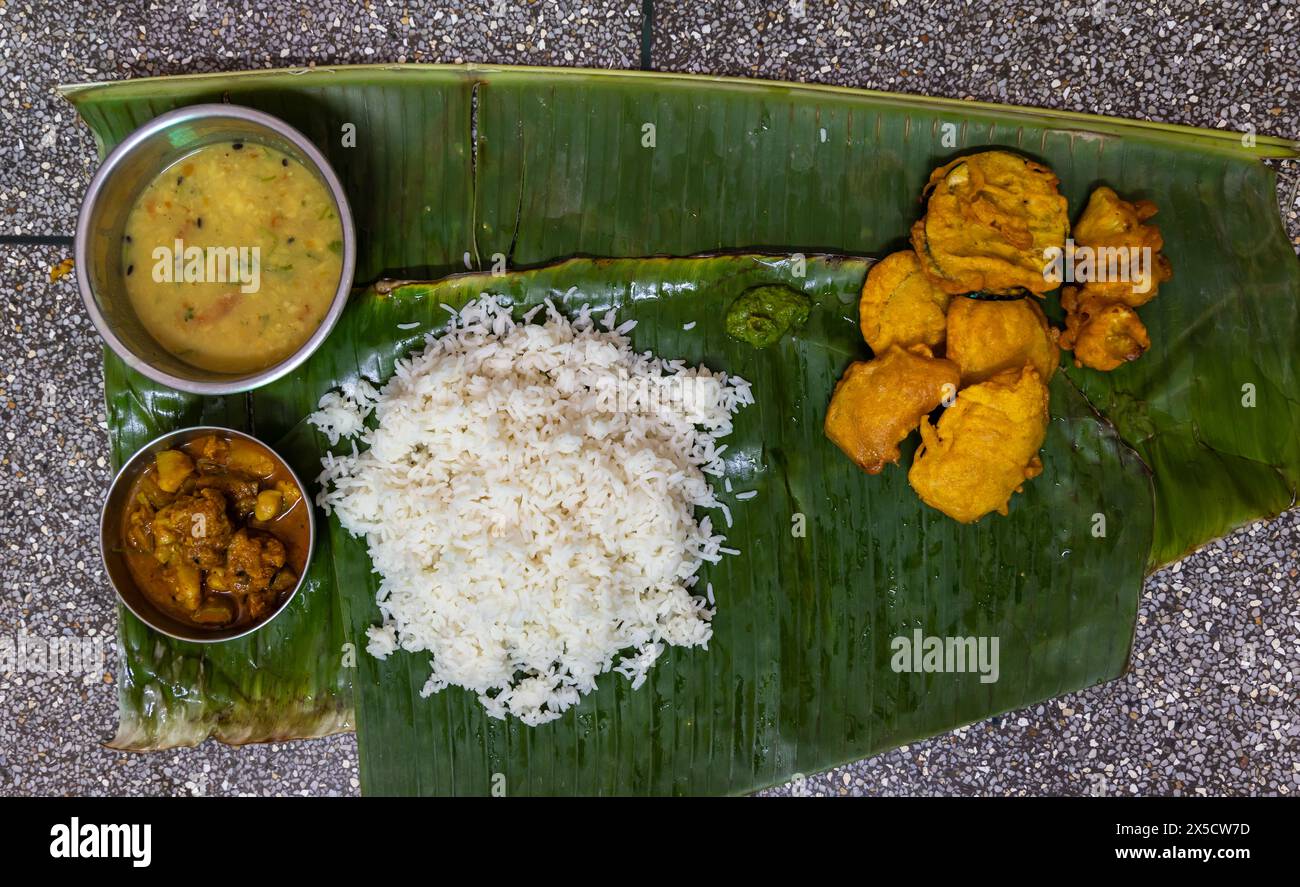 indian traditional launch served at banana leaf at home form top angle Stock Photo