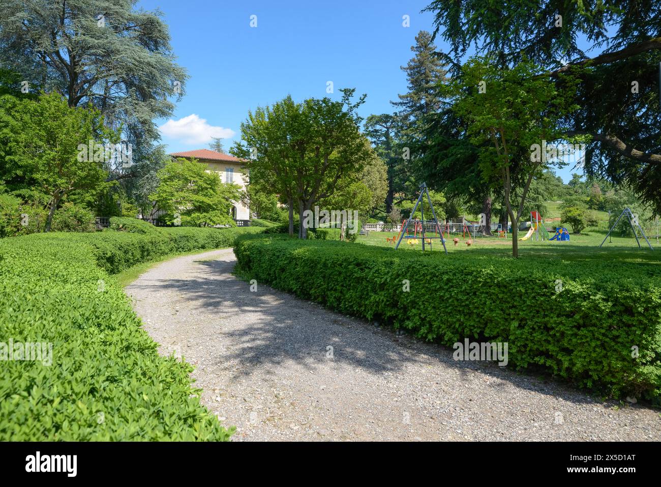 Public park with children's play area. Tradate city, Italy. Villa Inzoli Stock Photo