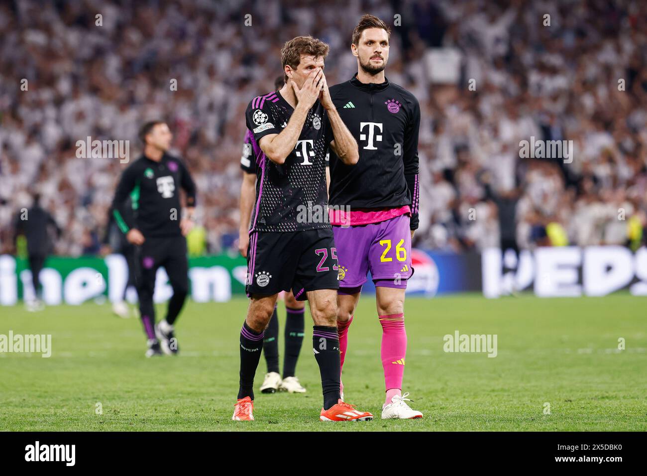 Thomas Muller and Sven Ulreich of Bayern Munich after loosing during the UEFA Champions League, Semi-finals, 2nd leg football match between Real Madrid and Bayern Munich on May 8, 2024 at Santiago Bernabeu stadium in Madrid, Spain Stock Photo