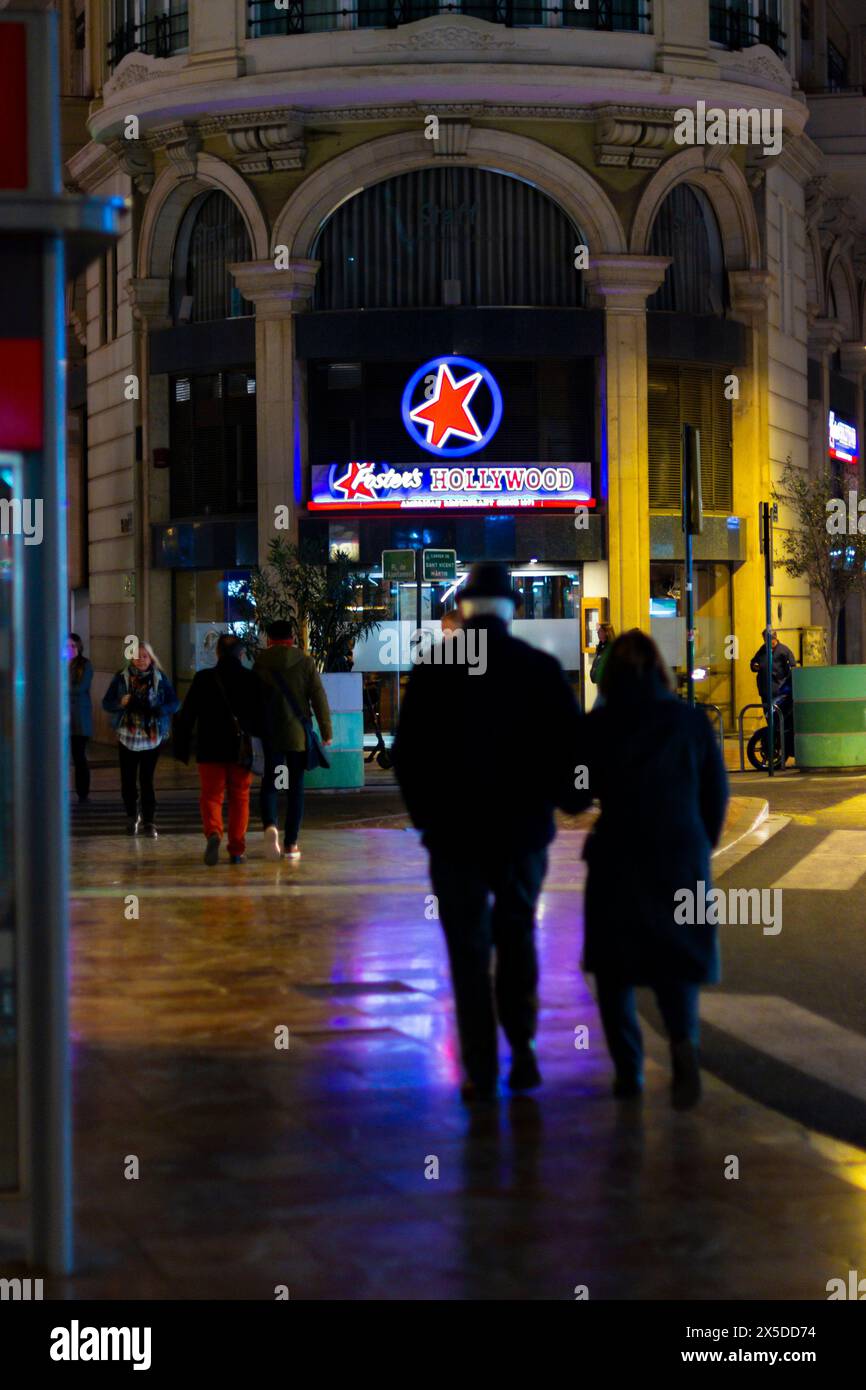Valencia, Spain. January, 23, 2023 - Door of the Foster's Hollywood fast food restaurant in Valencia. night photo Stock Photo