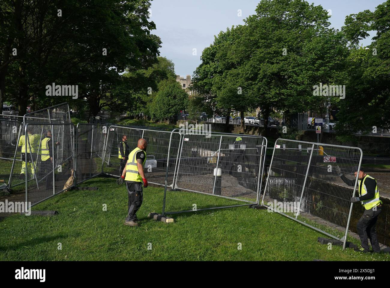 Fences are erected following an early morning operation to remove tents which have been pitched by asylum seekers along a stretch of the Grand Canal, Dublin. The asylum claimants moved into the area after another makeshift migrant camp surrounding the International Protection Office (IPO) on Mount Street, Dublin, was dismantled in multi-agency operation last week. Picture date: Thursday May 9, 2024. Stock Photo