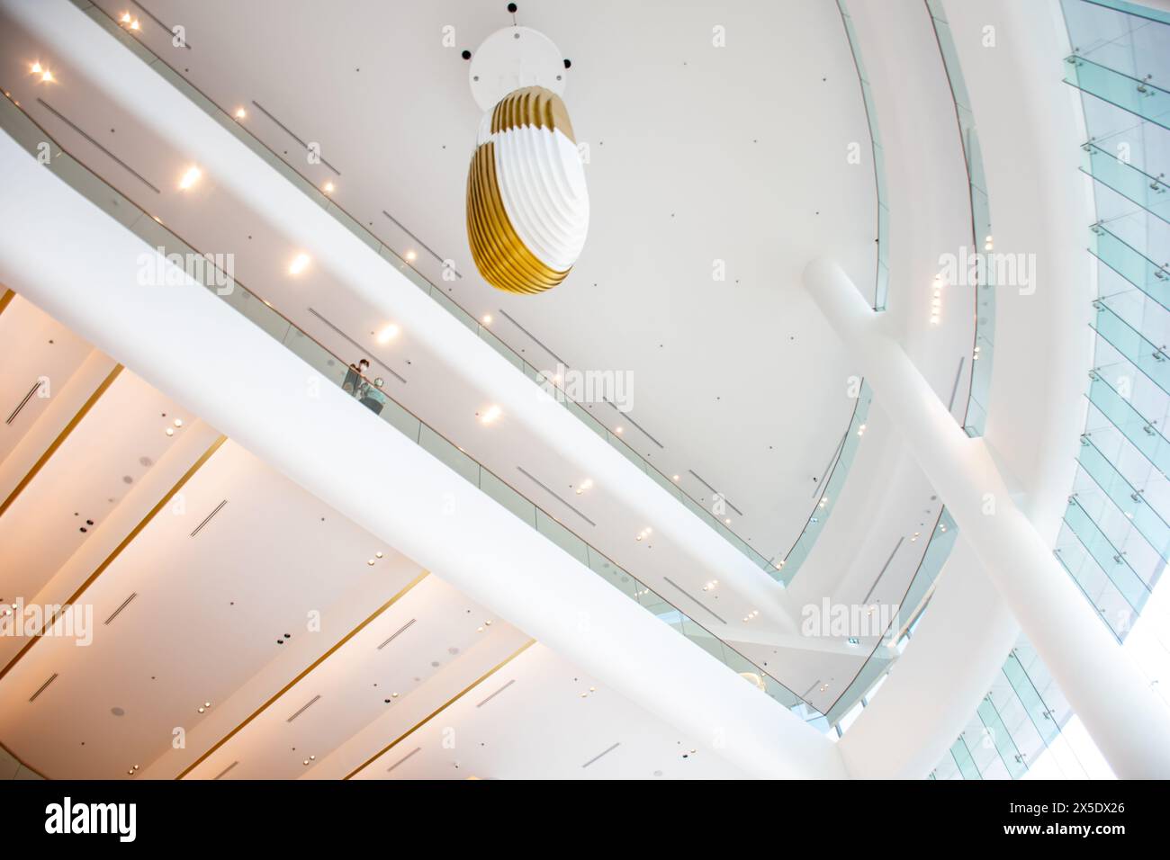 The ceiling inside the large hall, luxurious and modern. Decorated in white tones. There is a glass window for natural light Stock Photo