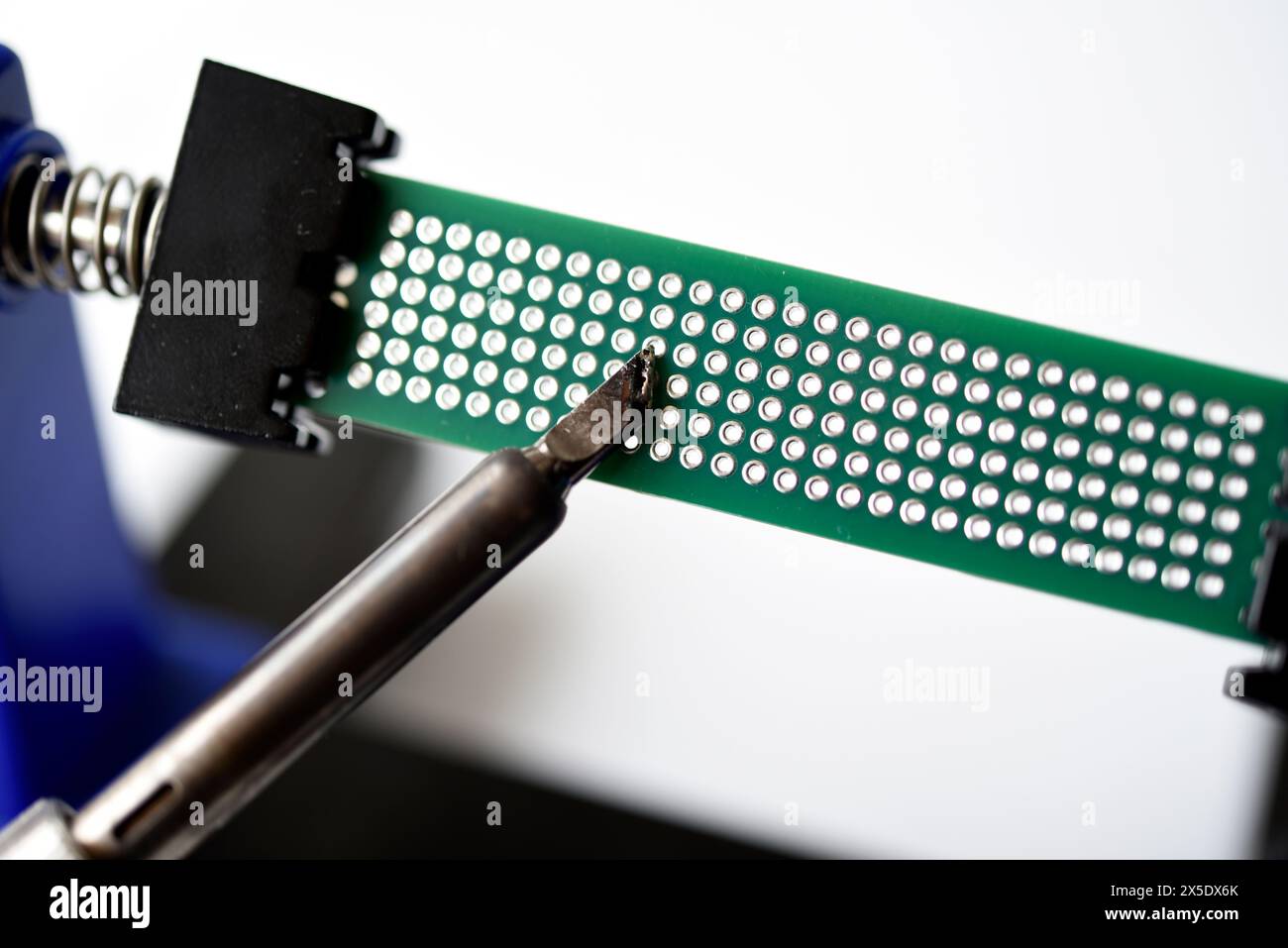 A printed circuit board for trace elements. Radio electronics. A holder