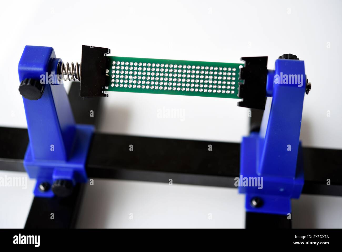 A printed circuit board for trace elements. Radio electronics. A holder