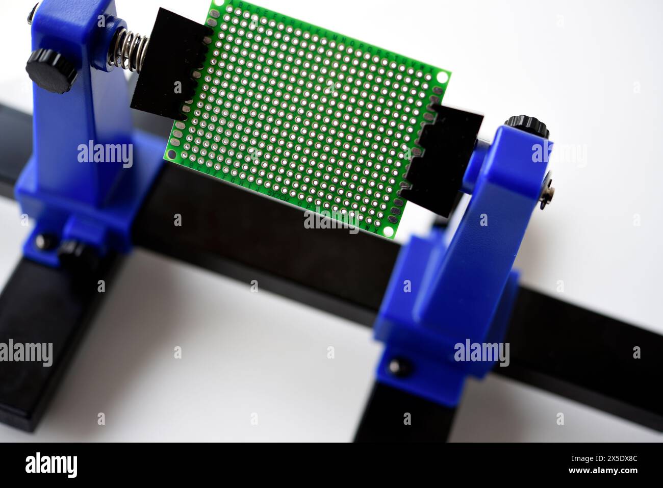 A printed circuit board for trace elements. Radio electronics. A holder