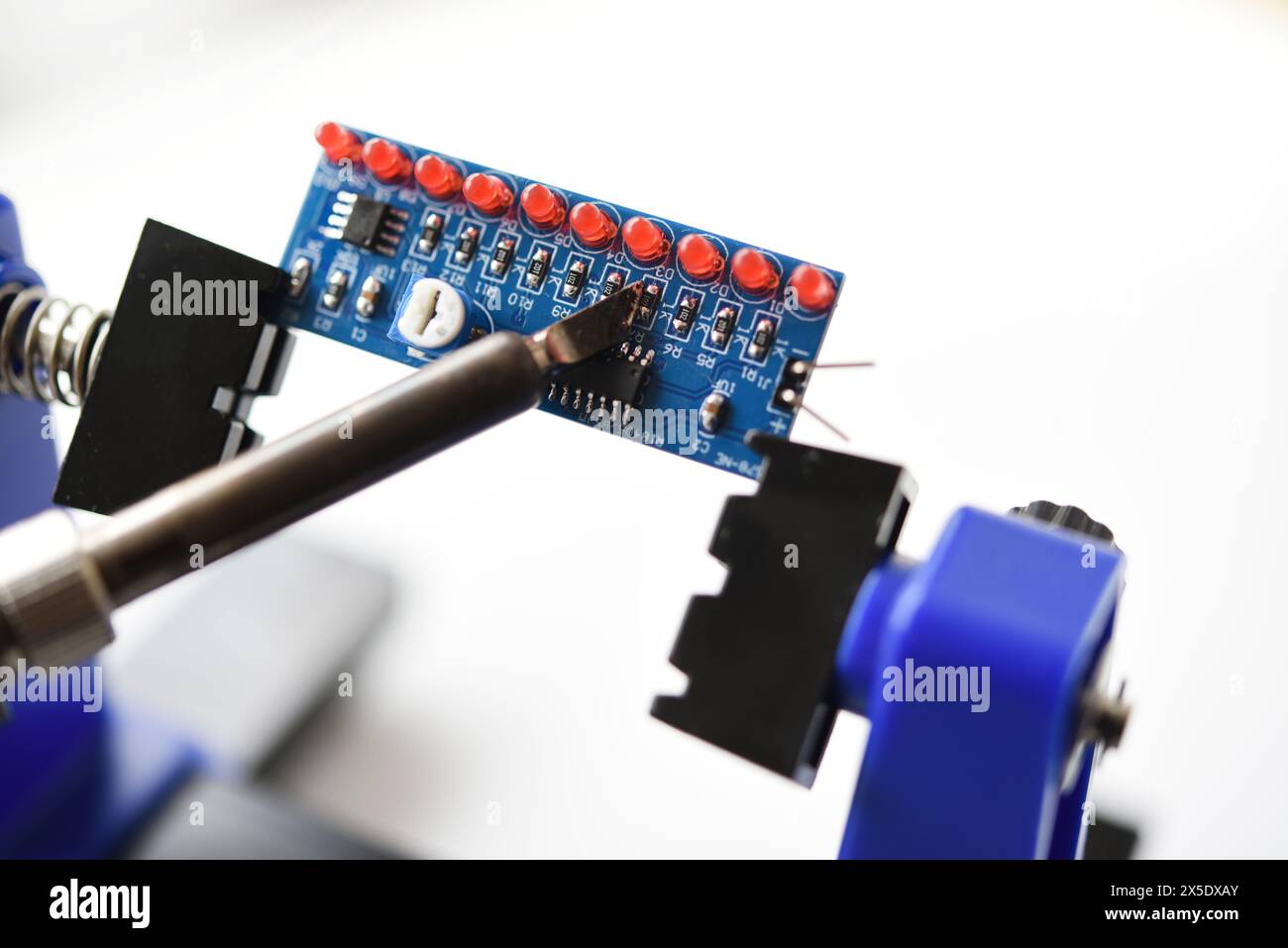 A printed circuit board for trace elements. Radio electronics. A holder