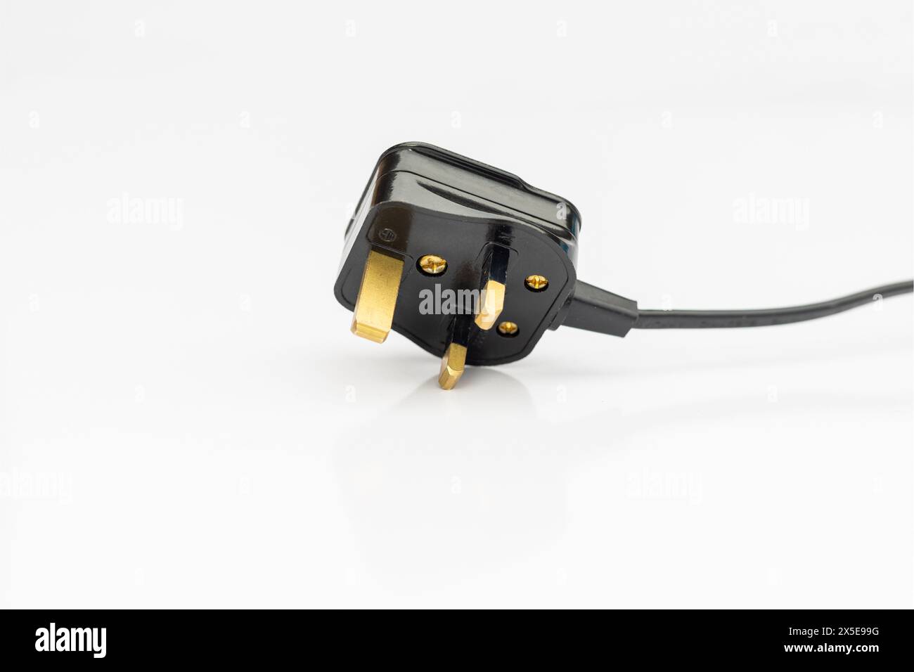 UK standard AC line plug isolated on white background Stock Photo