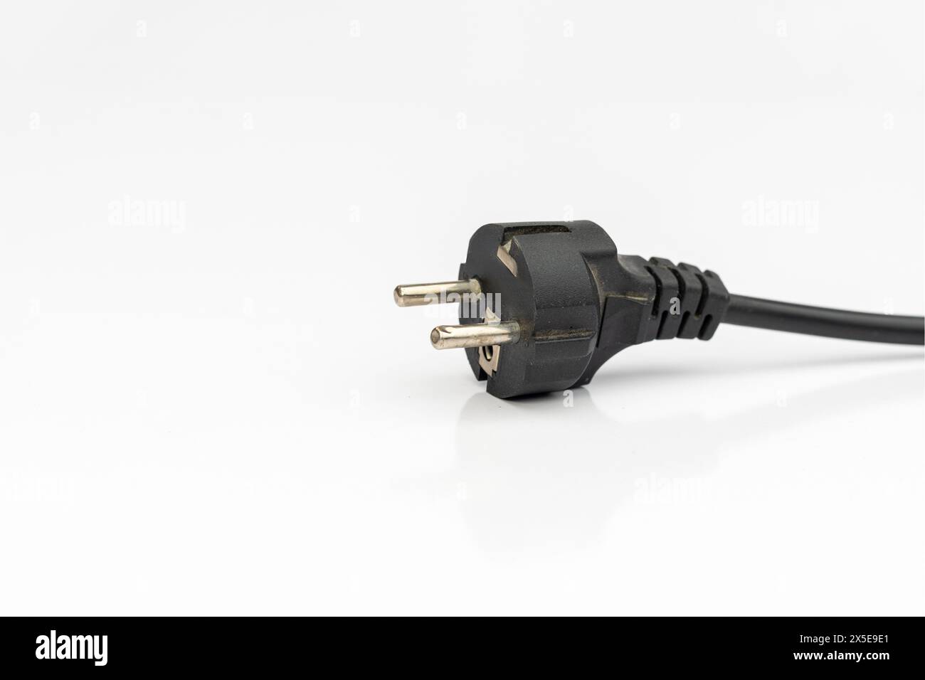 Black electric computer power supply cable isolated on a white background Stock Photo