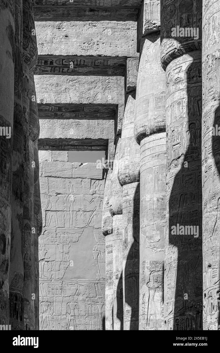 The Karnak Temple columns and sections that remain as ruins within the complex. Painted hieroglyphs, huge stonework dating c.1970 BCE. Luxor, Egypt Stock Photo