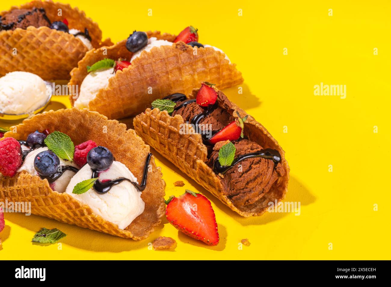 Various sweet taco ice creams. Waffle taco shells with chocolate and ...