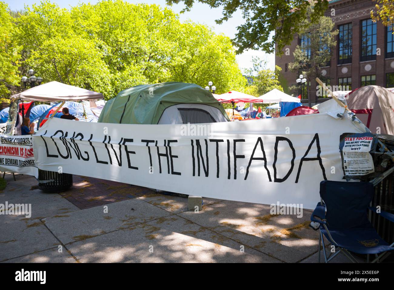 Long Live the Intifada banner at the Gaza support encampment  on the diag at the University of Michigan, Ann Arbor Michigan USA Stock Photo