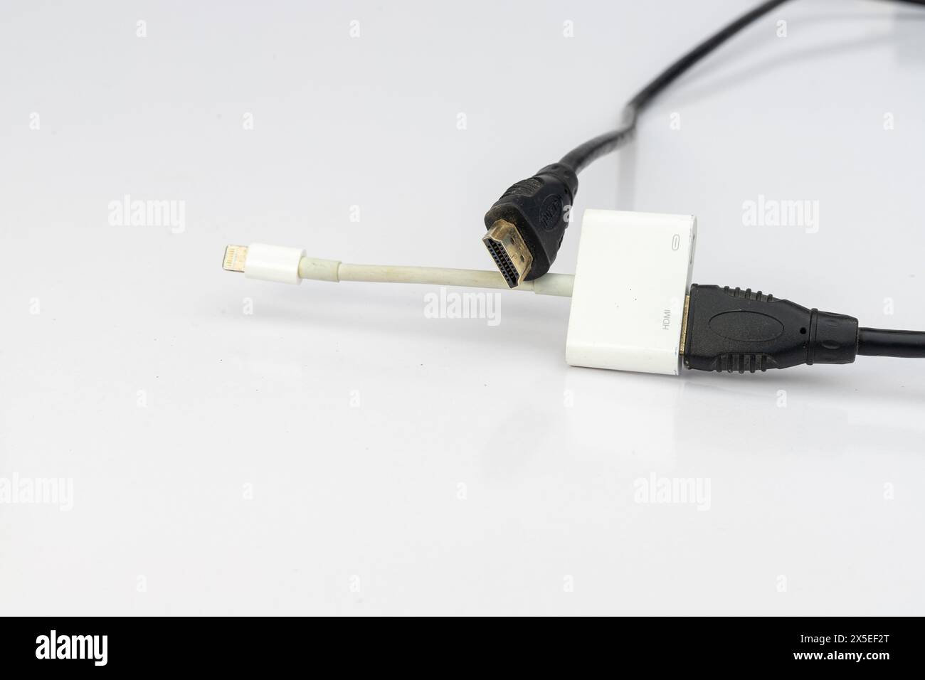 Lightning digital AV adapter connected to HDMI cable isolated on white background Stock Photo