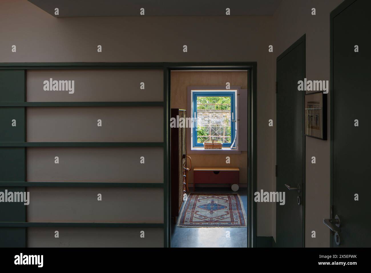 View outwards from an interior hallway. Straw Bale House, Islington